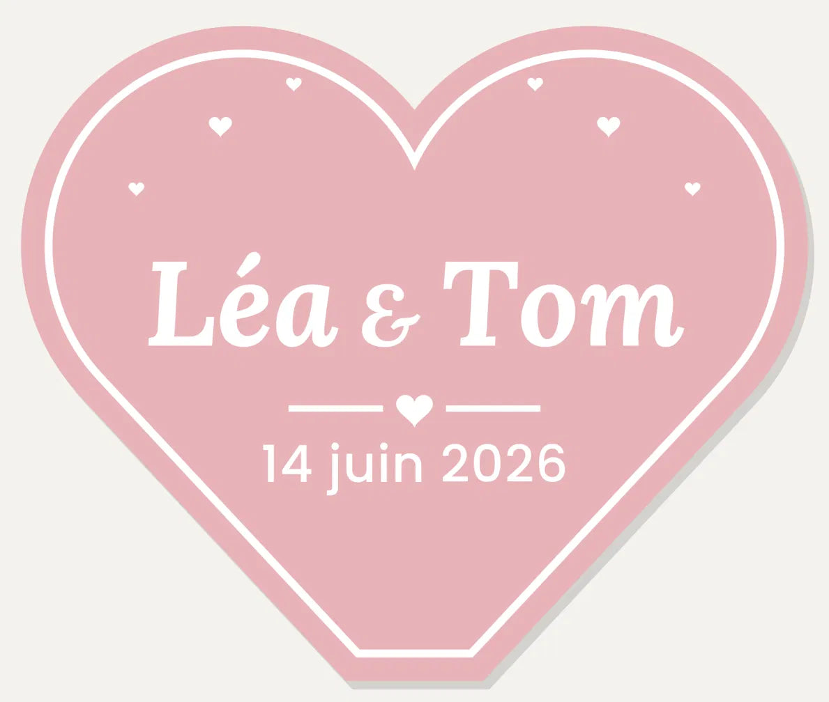 Plaque de mariage en forme de cœur rose, prénoms et date en relief blanc - L'Empreinte